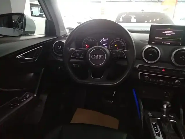 Audi Q2L — Фото автомобиля 10