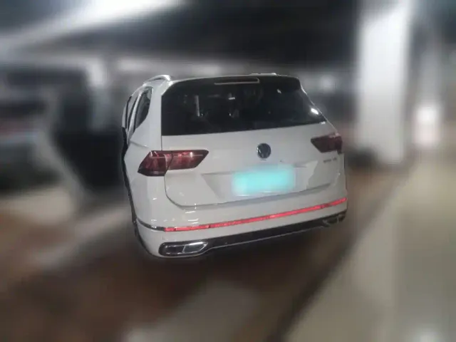 Volkswagen Tiguan L — Фото автомобиля 24
