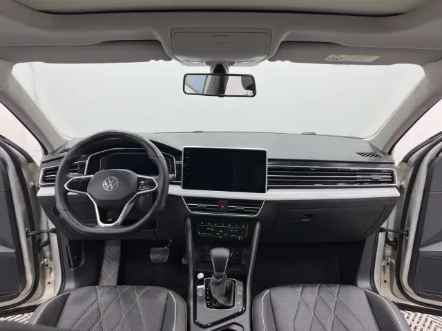 Volkswagen Tiguan L — Фото автомобиля 5