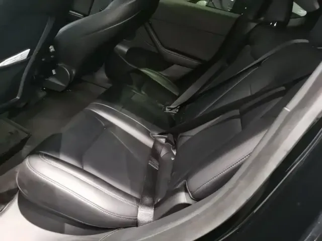 Tesla Model Y — Фото автомобиля 16