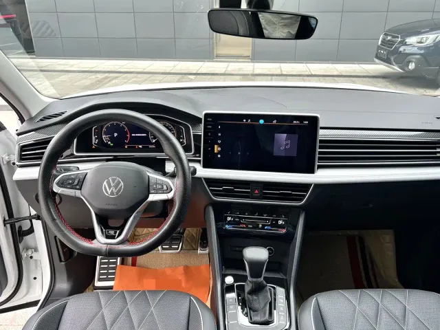 Volkswagen Tiguan L — Фото автомобиля 9