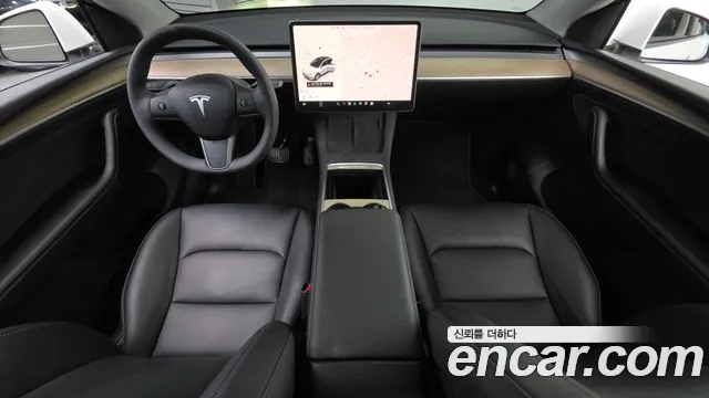 Tesla Model Y — Фото автомобиля 6