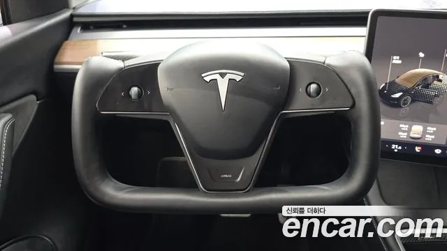 Tesla Model Y — Фото автомобиля 10