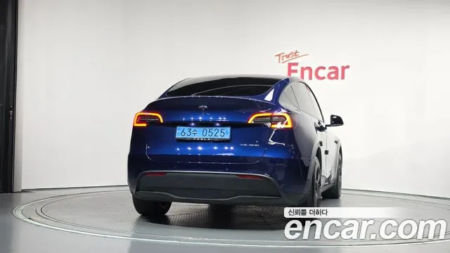 Tesla Model Y — Фото автомобиля 4