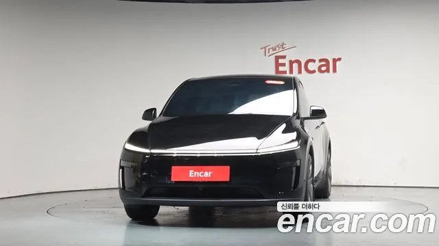 Tesla Model Y — Фото автомобиля 3