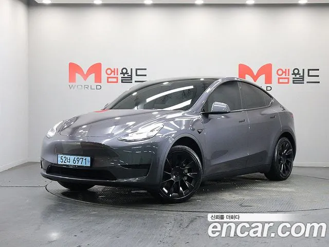 Tesla Model Y — Фото автомобиля 2