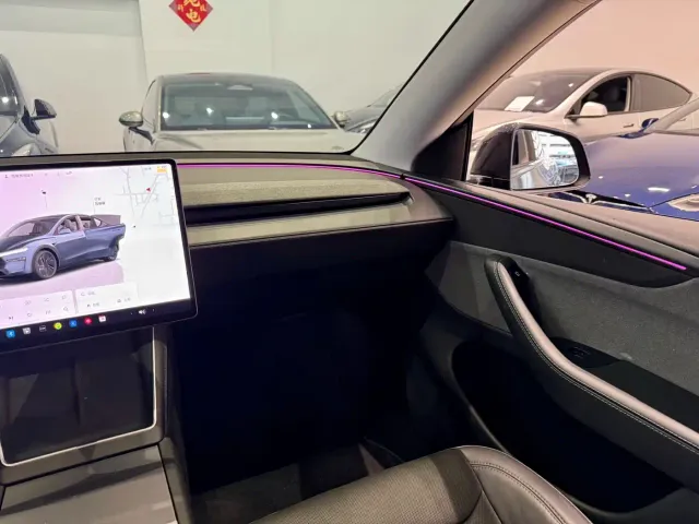 Tesla Model Y — Фото автомобиля 12