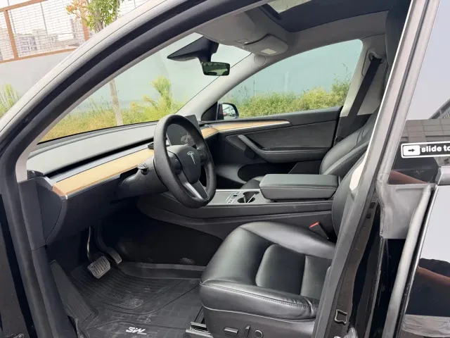 Tesla Model Y — Фото автомобиля 4
