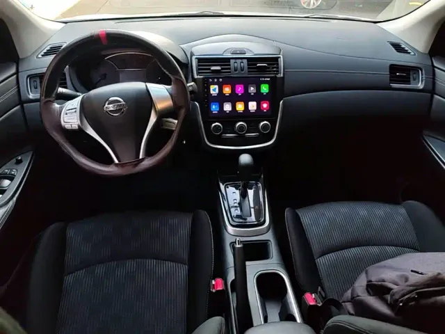 Nissan Tiida — Фото автомобиля 9