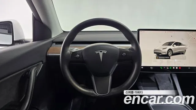 Tesla Model Y — Фото автомобиля 19
