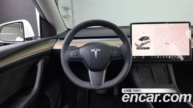 Tesla Model Y — Фото автомобиля 12