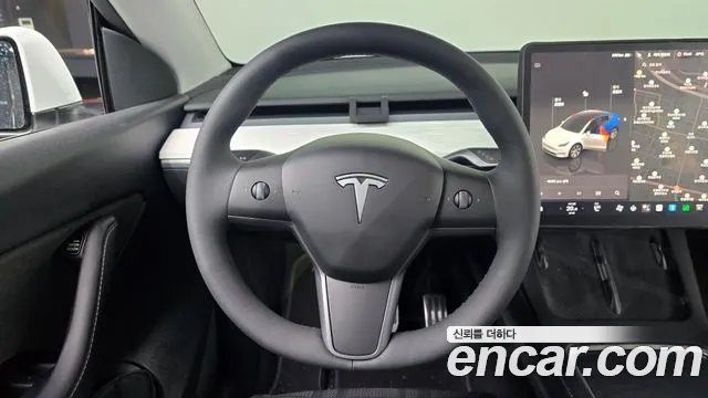 Tesla Model Y — Фото автомобиля 13