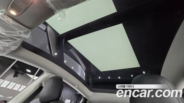 Tesla Model Y — Фото автомобиля 22
