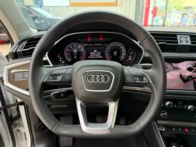 Audi Q3 — Фото автомобиля 11
