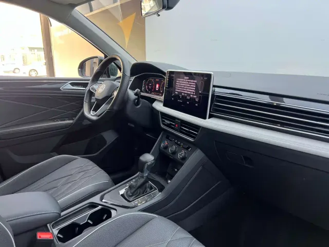 Volkswagen Tiguan L — Фото автомобиля 13