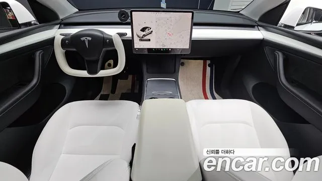 Tesla Model Y — Фото автомобиля 6