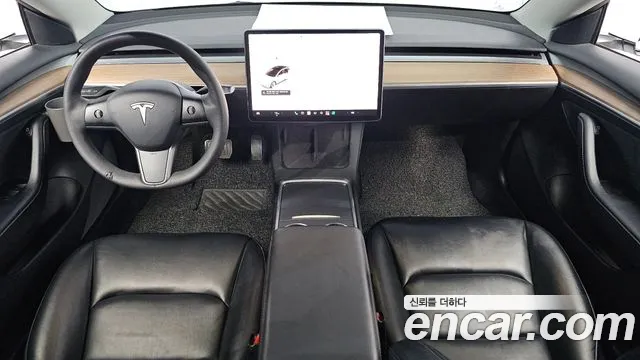 Tesla Model 3 — Фото автомобиля 9