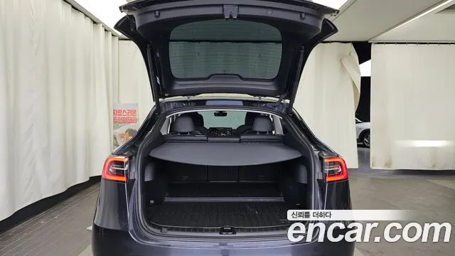 Tesla Model Y — Фото автомобиля 20