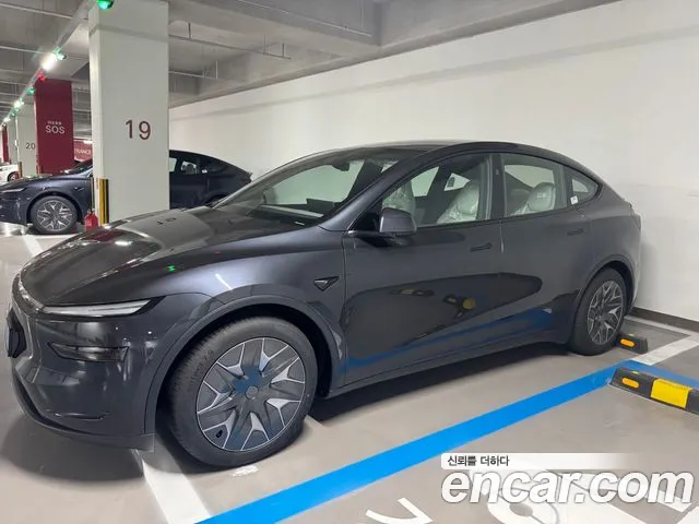 Tesla Model Y — Фото автомобиля 2