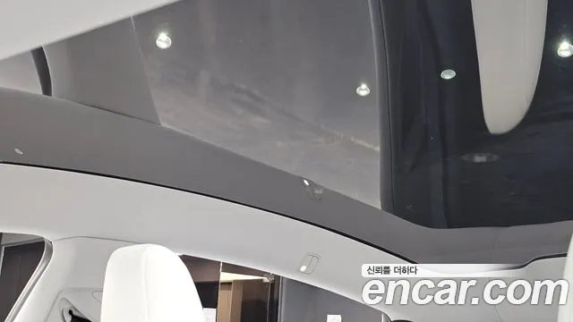Tesla Model Y — Фото автомобиля 24