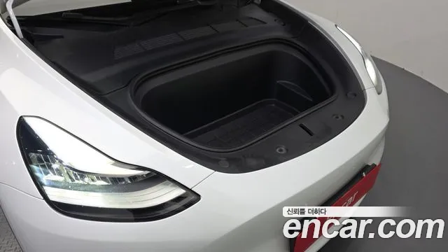 Tesla Model Y — Фото автомобиля 6