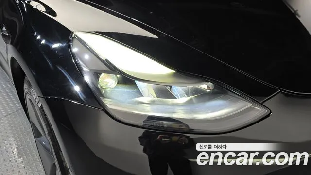 Tesla Model 3 — Фото автомобиля 7