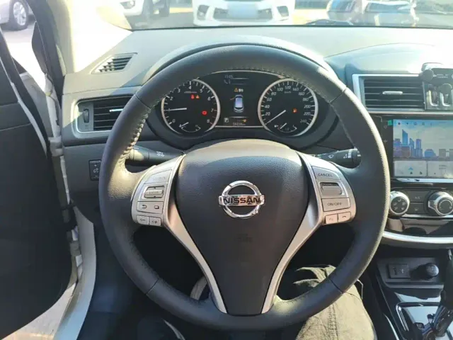 Nissan Tiida — Фото автомобиля 10