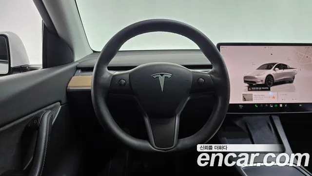 Tesla Model Y — Фото автомобиля 12