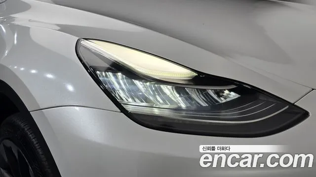 Tesla Model Y — Фото автомобиля 22