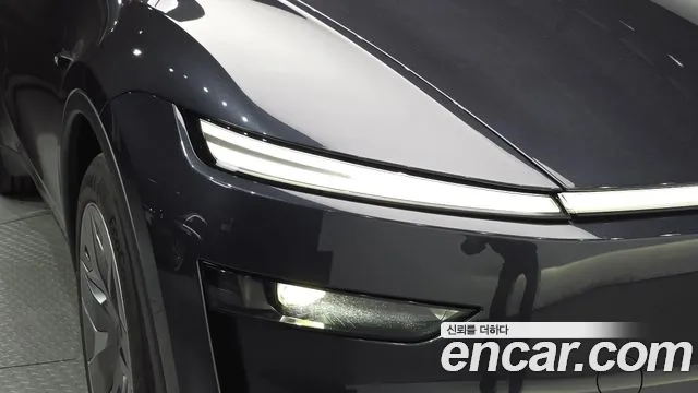 Tesla Model Y — Фото автомобиля 7