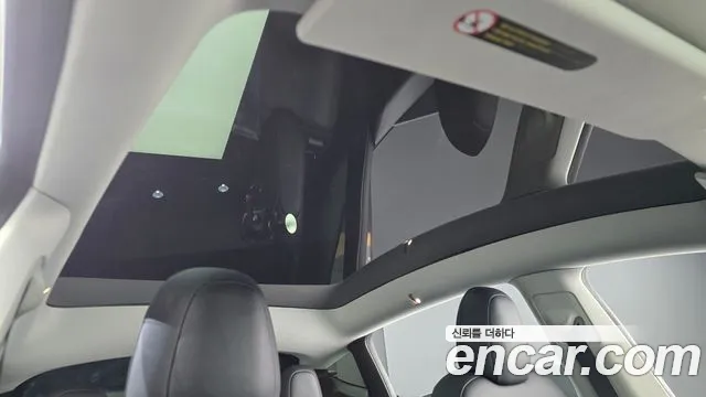 Tesla Model Y — Фото автомобиля 21