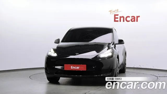Tesla Model Y — Фото автомобиля 3