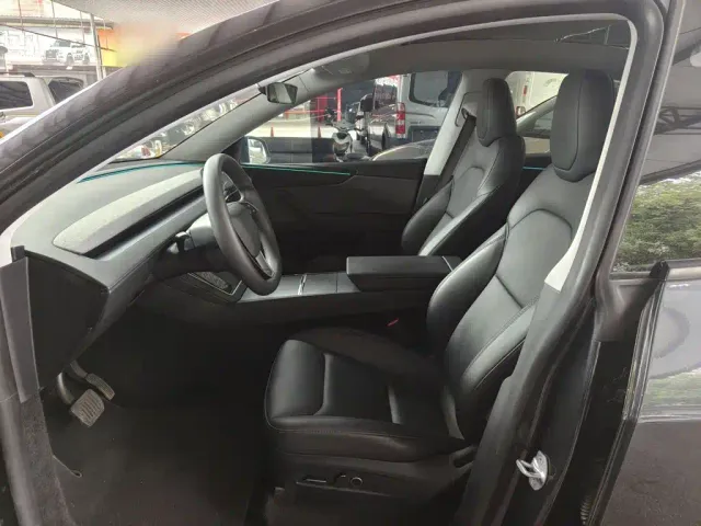 Tesla Model Y — Фото автомобиля 14