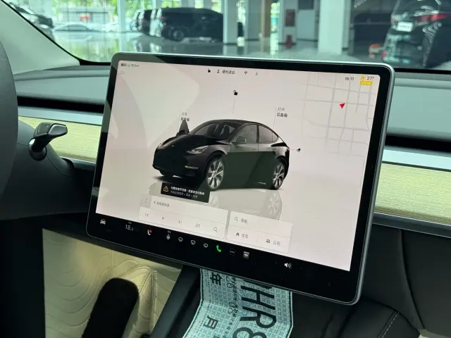 Tesla Model Y — Фото автомобиля 11