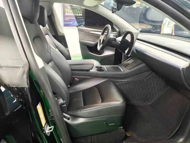 Tesla Model Y — Фото автомобиля 7