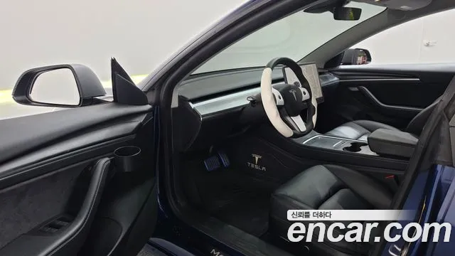 Tesla Model 3 — Фото автомобиля 10