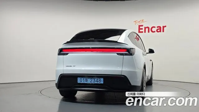 Tesla Model Y — Фото автомобиля 4
