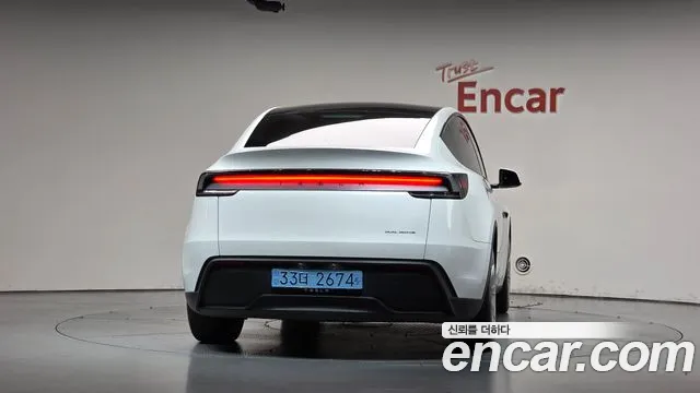 Tesla Model Y — Фото автомобиля 4