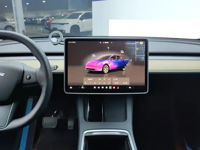 Tesla Model Y — Фото автомобиля 13