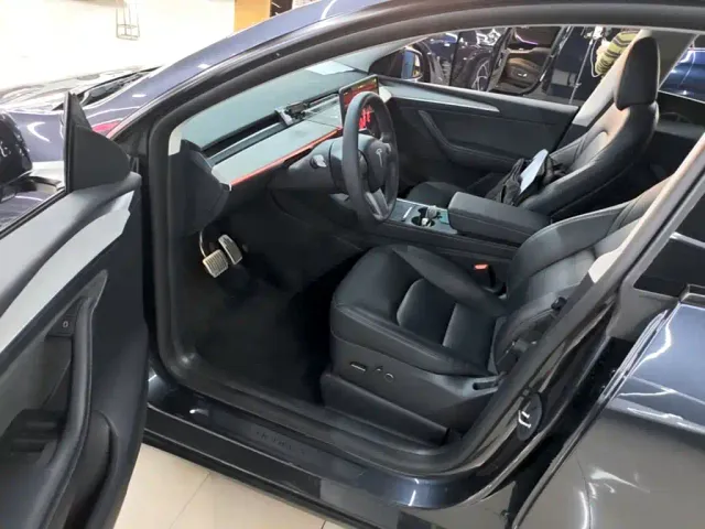 Tesla Model Y — Фото автомобиля 15
