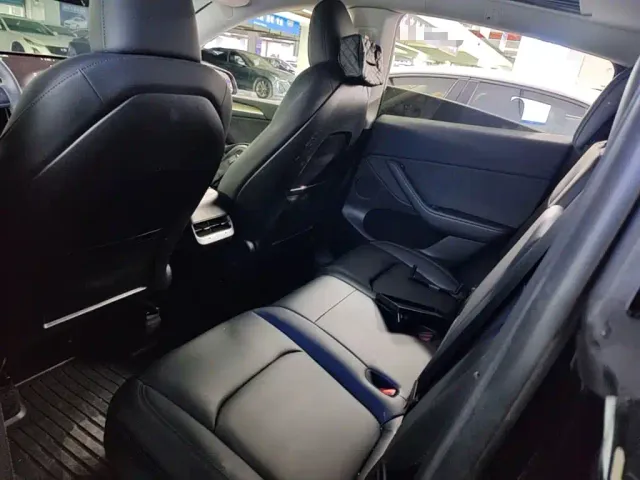 Tesla Model Y — Фото автомобиля 16
