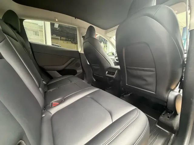 Tesla Model Y — Фото автомобиля 10