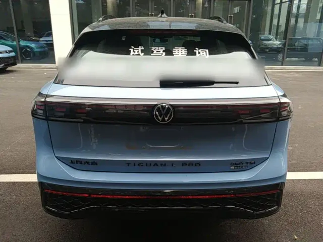 Volkswagen Tiguan L — Фото автомобиля 5