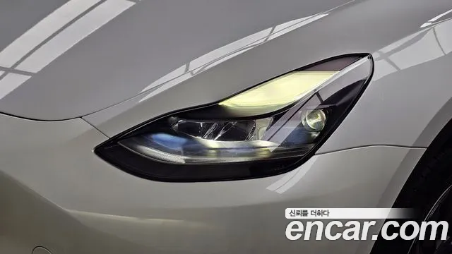 Tesla Model Y — Фото автомобиля 7