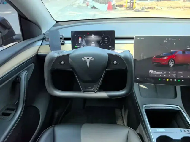 Tesla Model Y — Фото автомобиля 10