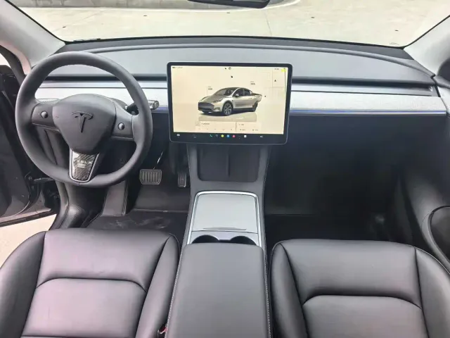 Tesla Model Y — Фото автомобиля 5