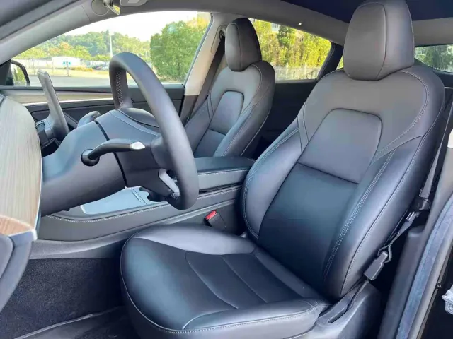 Tesla Model Y — Фото автомобиля 16