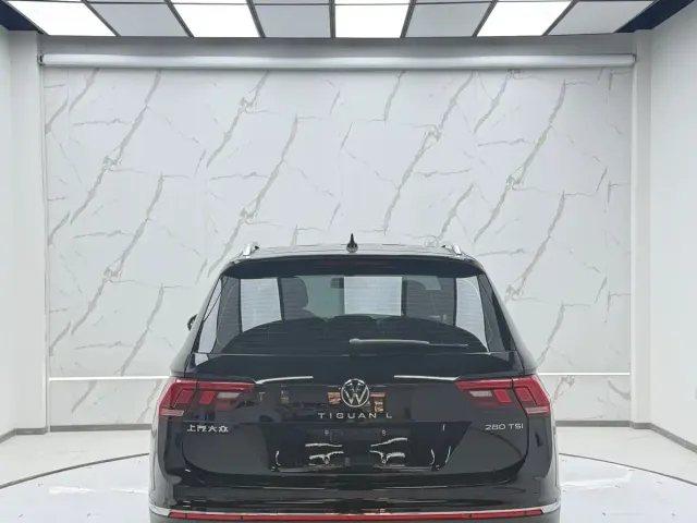 Volkswagen Tiguan L — Фото автомобиля 4
