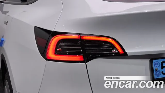 Tesla Model Y — Фото автомобиля 8