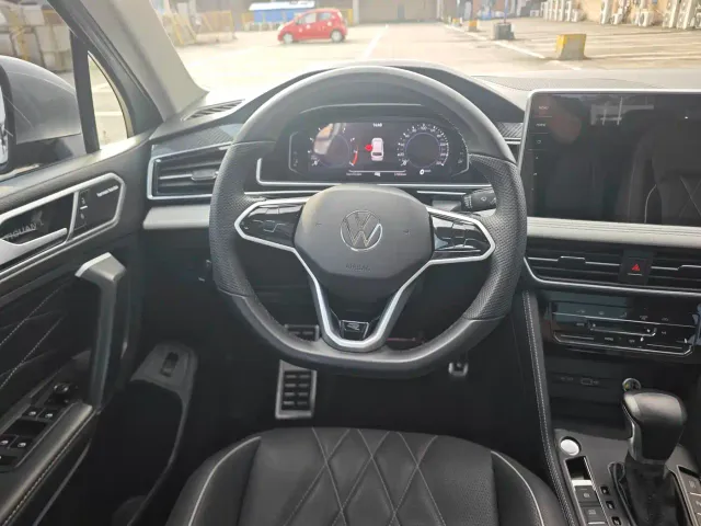 Volkswagen Tiguan L — Фото автомобиля 12